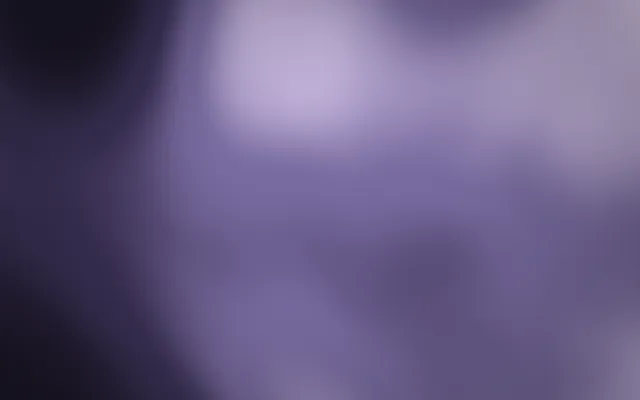 Blurred fields of lavender and violet, darkest in the left corner and palest in a soft glow near the top.
